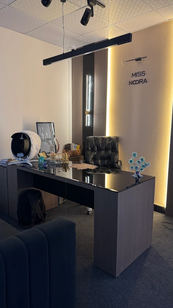 Miss Noora consultation office — professional setting with warm lighting